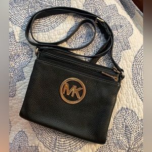 Black and gold Michael Kors Crossbody purse